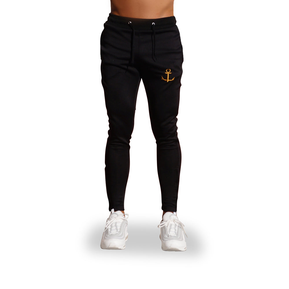 Delta Track Pants Negro Ancla Dorada