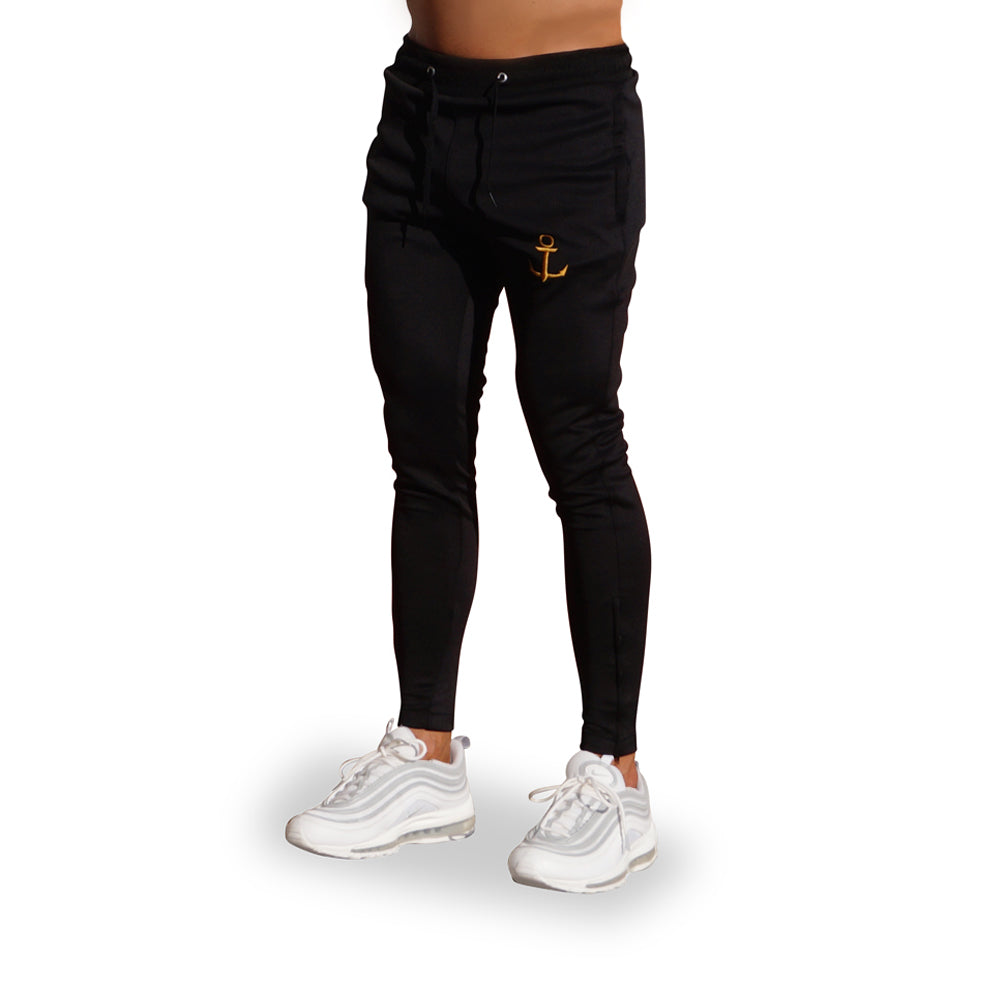 Delta Track Pants Negro Ancla Dorada